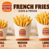 Burger King fries in small, medium, and large sizes with price tags